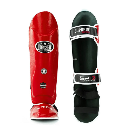 Supreme shin guards red front and black back view with top gear branding
