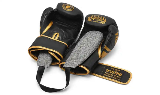 Pair of leather boxing gloves drying after training