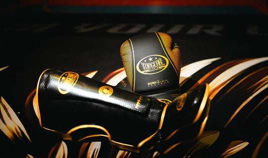 Top Gear boxing gloves designed for professional training and hand protection