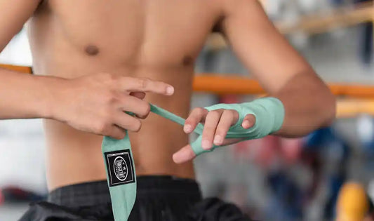 Athlete wearing Top Gears Sports® hand wraps before training