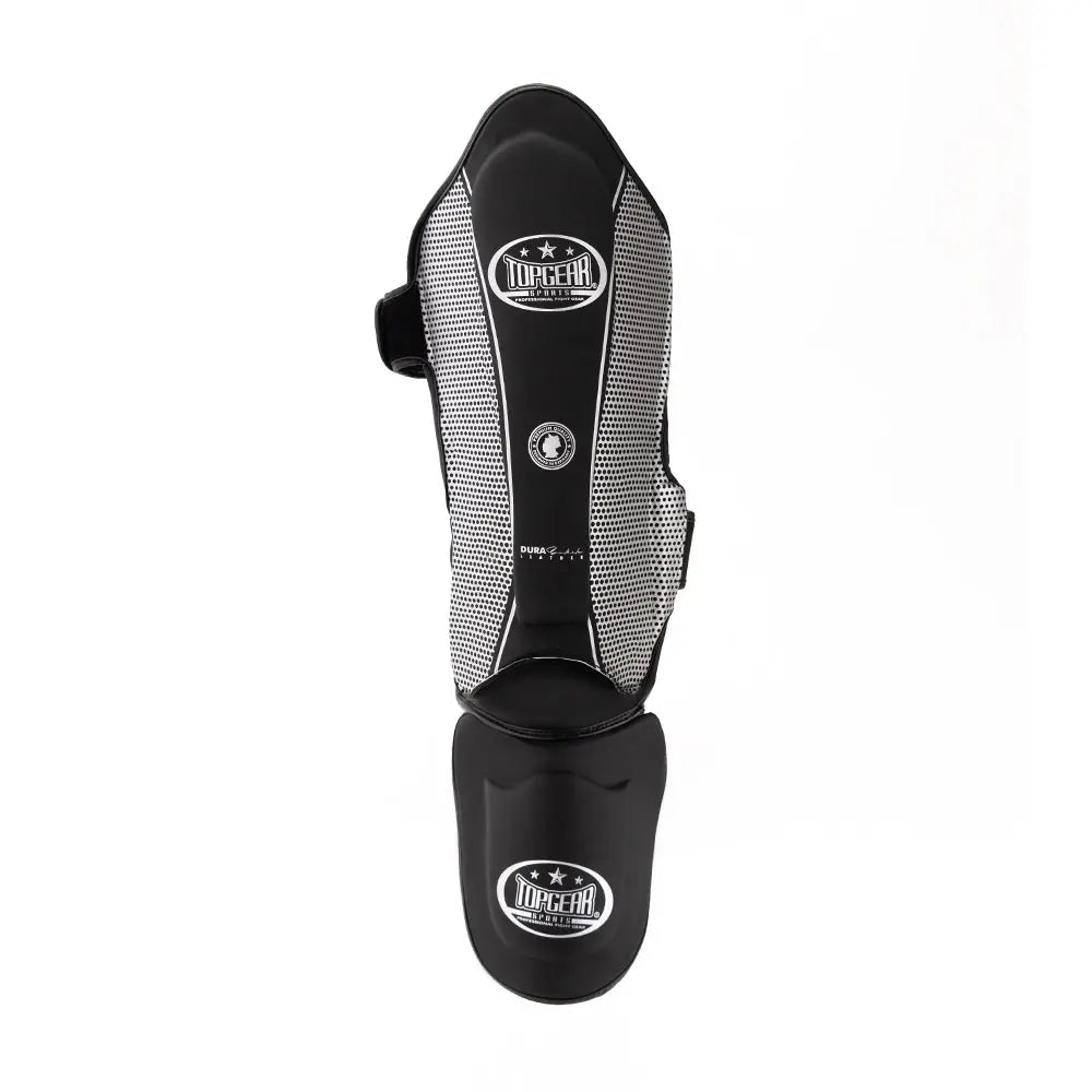 Front view of Topgear Titan shin guard with foot protector in black and white