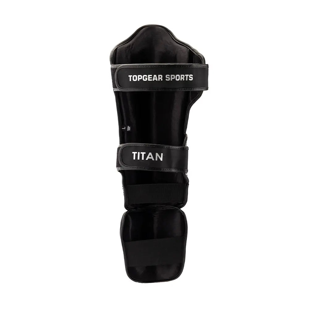 Back view of Topgear Titan shin guard showing TOPGEAR SPORTS strap and TITAN strap
