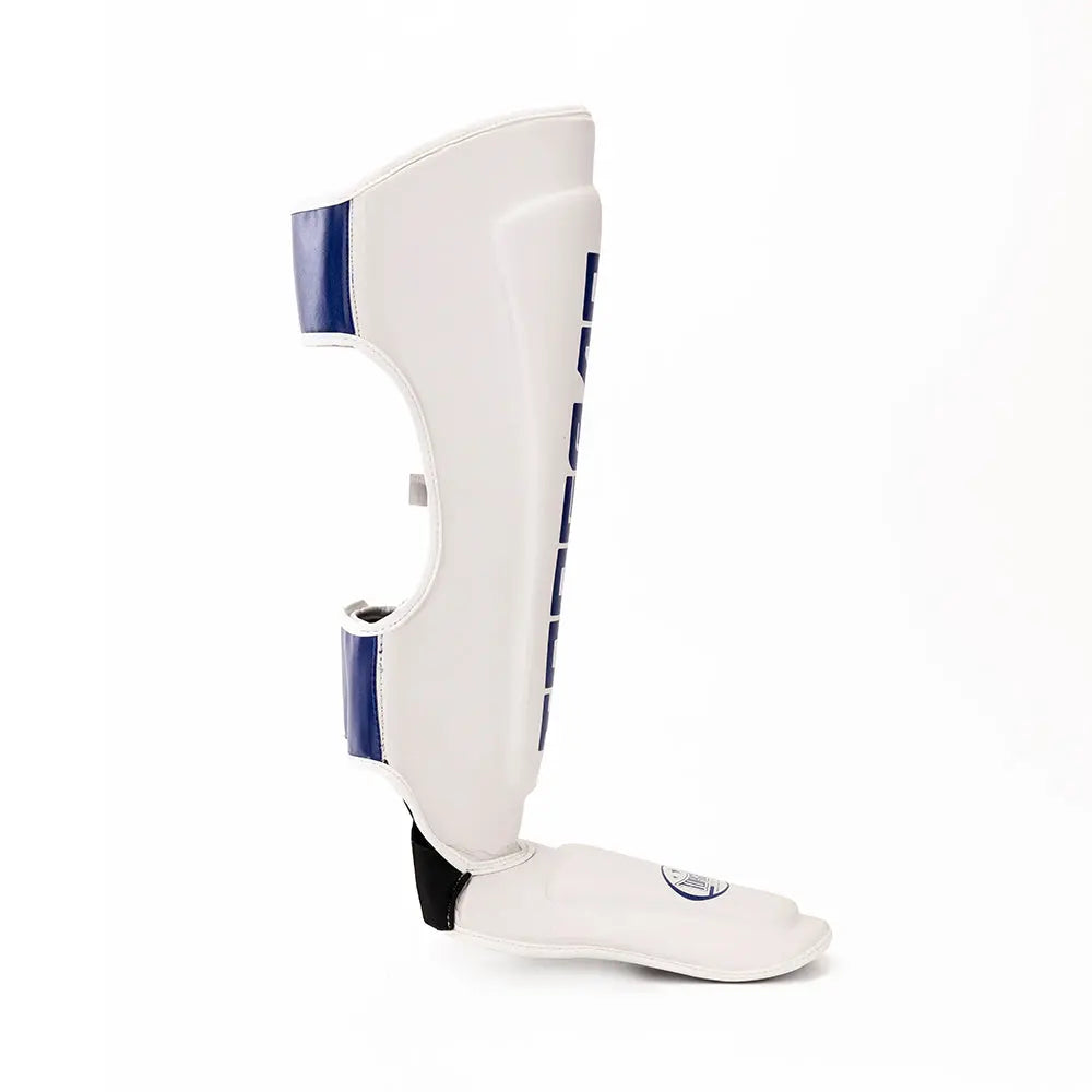 TOPGEAR Tyson shin guards side view close up showing curved shin shape and attached foot guard